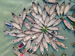 Leinwandbilder Olivgrün Aerial view of wooden passenger boats along the Buriganga River, Keraniganj, Dhaka, Bangladesh.  © Muhammadamdadphoto