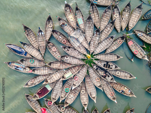 Photography Aerial view of wooden passenger boats along the Buriganga River, Keraniganj, Dhaka, Bangladesh