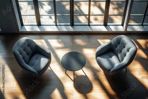 Cozy seating area with modern chairs and coffee table in a sunlit room