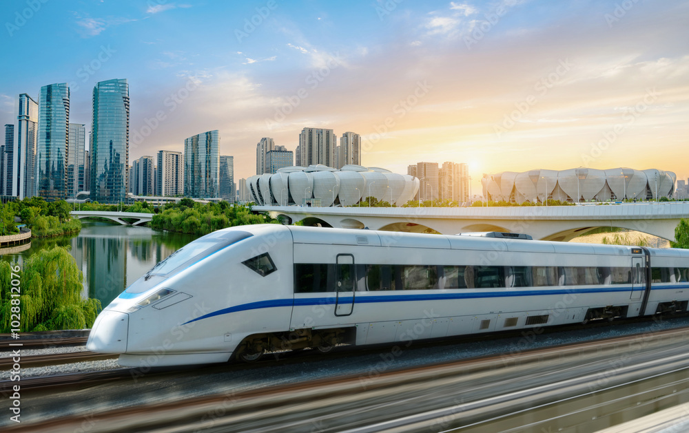High-speed rail speeds on Bridges and the modern city skyline of hangzhou, China