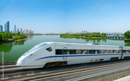 Obraz na płótnie High-speed rail speeds on Bridges and the modern city skyline of shaoxing, zhejiang,China w salonie