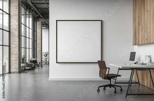 Modern office space featuring a minimalist design with a blank canvas on the ...
