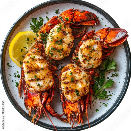 Freshly cooked lobster served on an elegant plate with lemon and herbs at a s...