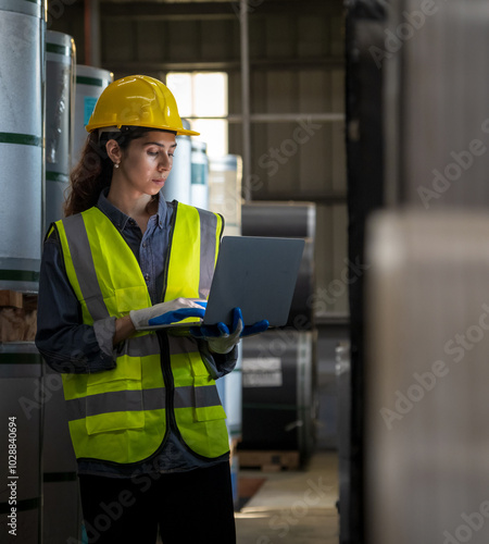 Leader manager staff engineer technician team woman stand hard hat hand holding labtop check quality order discuss working new project business technology produc in workshop industry factory warehouse