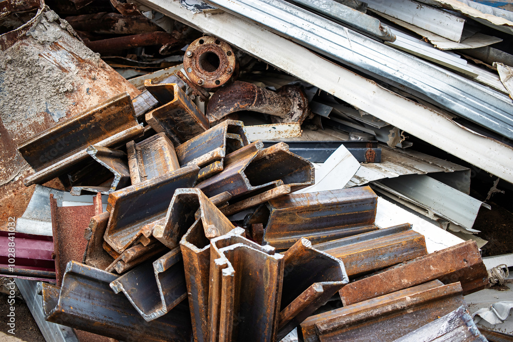 Metal scraps from production processes are gathered for recycling at a fabrication plant, showcasing the raw materials ready for repurposing and sustainability efforts Metal scraps from production processes are gathered for recycling at a fabrication plant, showcasing the raw materials ready for repurposing and sustainability efforts