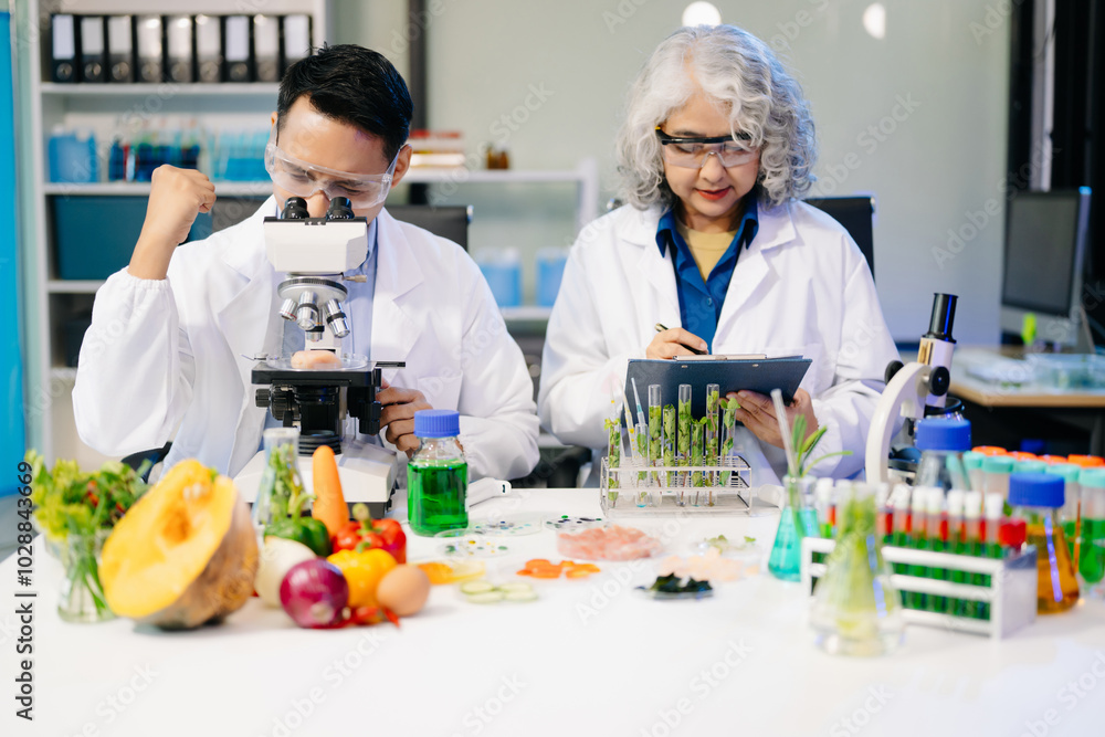Food scientists in lab coats, testing samples, and analyzing food safety and quality in a modern laboratory Food scientists in lab coats, testing samples, and analyzing food safety and quality in a modern laboratory