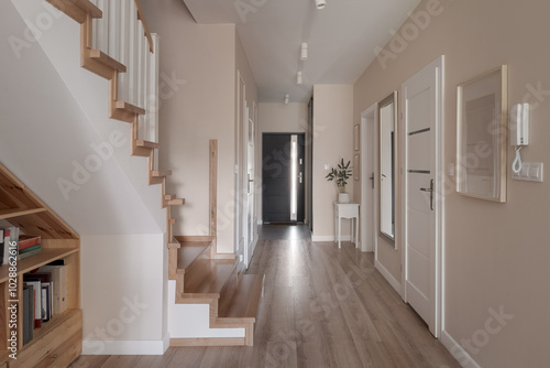 House corridor with entry and staircase