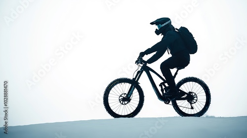 Minimalist Silhouette of Mountain Biker on White Background