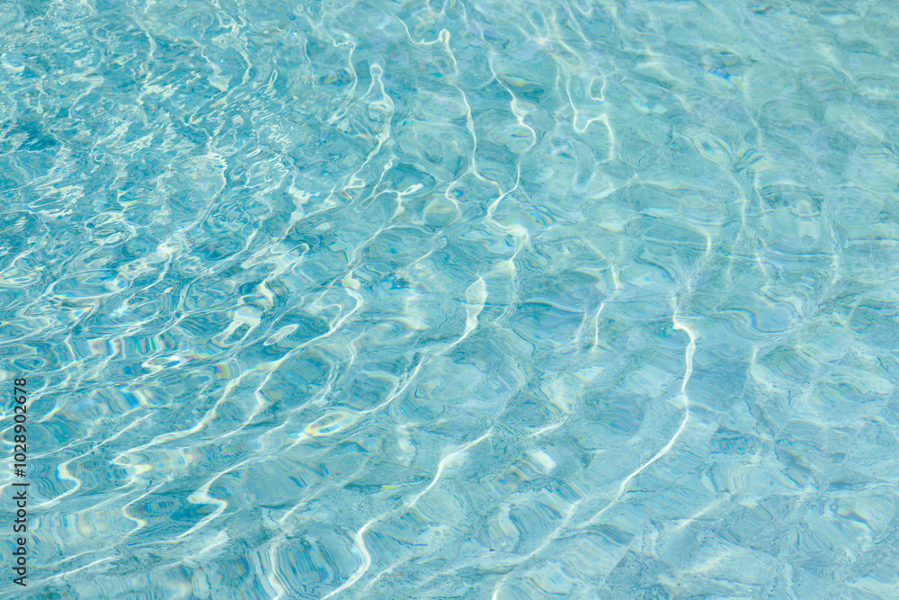 Obraz premium abstract blue color water wave in swimming pool pure natural swirl pattern texture