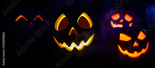 luminous jack-o'-lanterns create a spooky halloween atmosphere