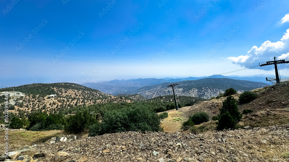 View from the top of Olympos. Troodos Mountains. Cyprus, June 2024. View from the mountains View from the top of Olympos. Troodos Mountains. Cyprus, June 2024. View from the mountains