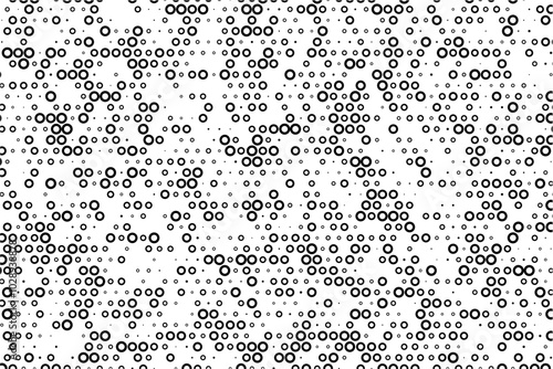 Random sized dotted grid with hollow center circles