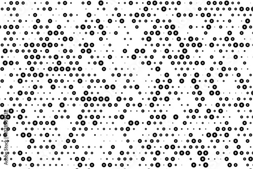 Random sized dotted grid with hollow center circles