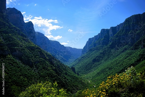 
Panoramic view over the steep and green cliffs of the Vikos Gorge in Epirus, Greece on a summer's day. The gorge in the Pindus Mountains is one of the deepest gorges in the world. Hiking in Greece photo