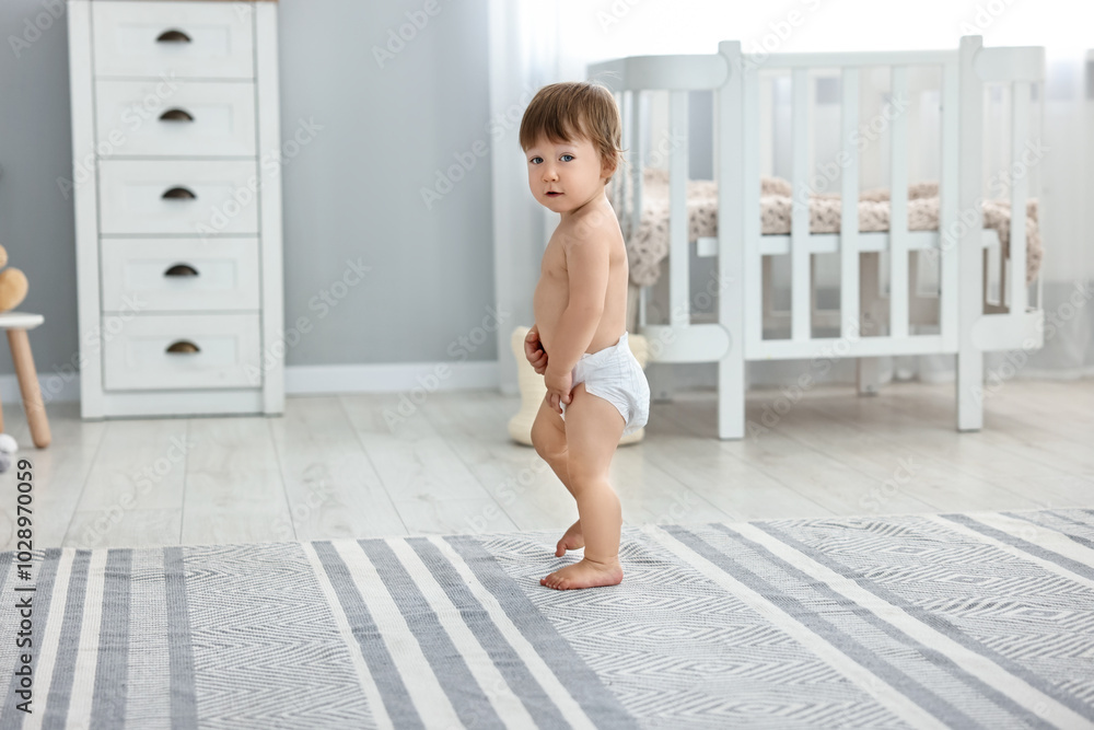 Fototapeta premium Cute little child in diaper at home