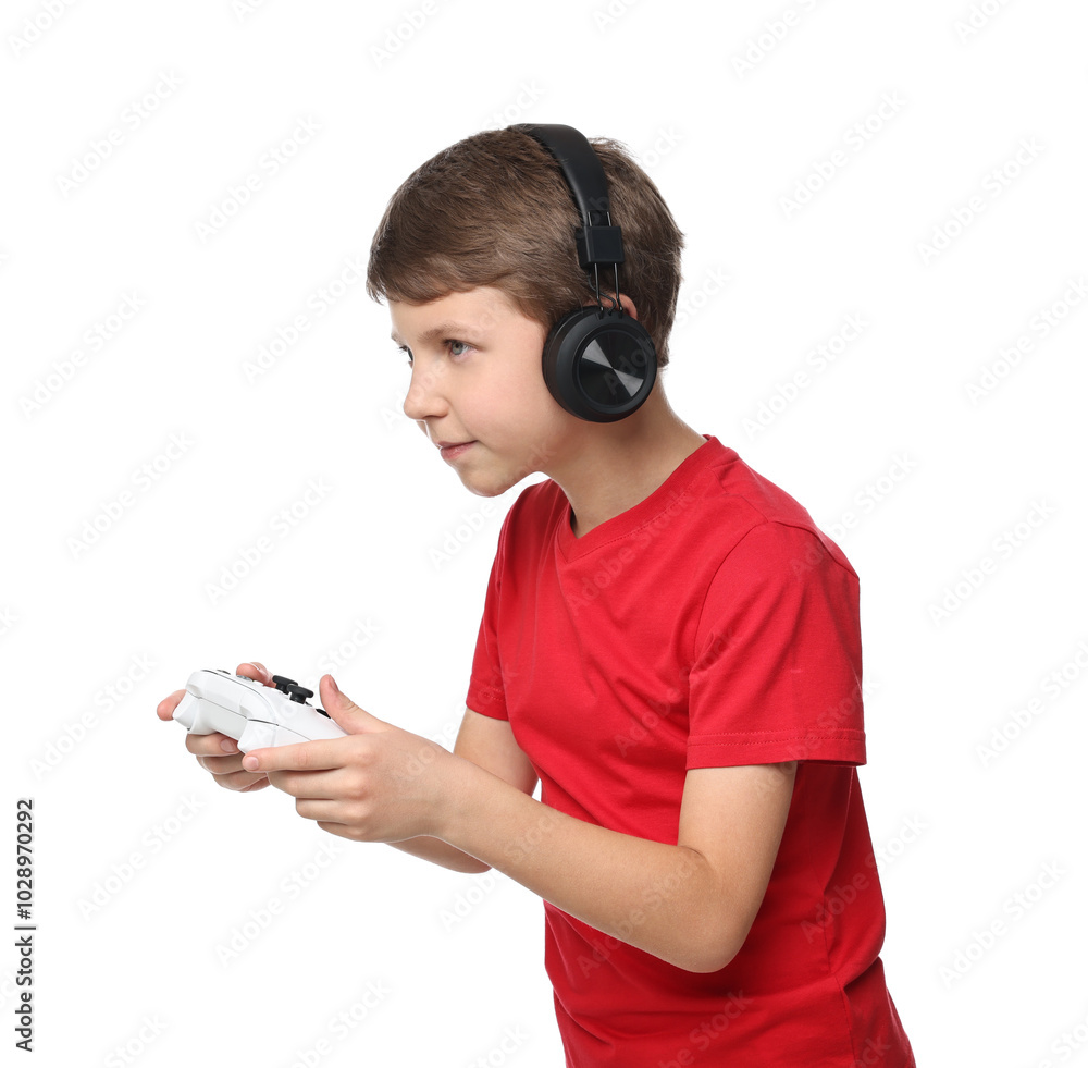 Cute little boy in headphones playing video game with controller on white background Cute little boy in headphones playing video game with controller on white background