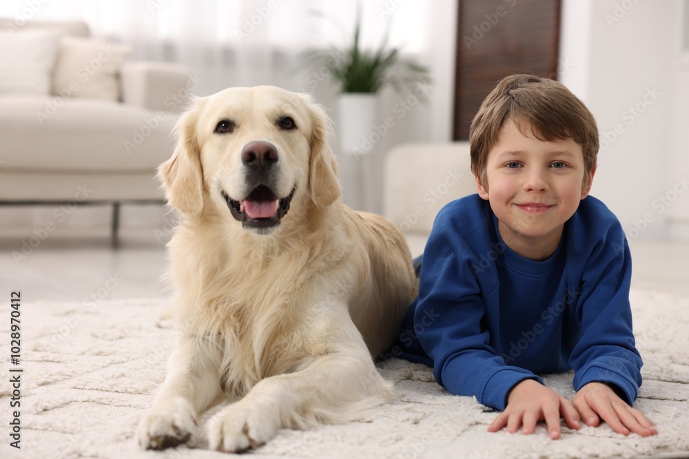 Boy with his cute dog at home Boy with his cute dog at home