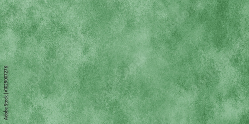 Abstract Elegant dark green background with mottled vintage texture in old fancy background design, texture of colored parchment paper.
