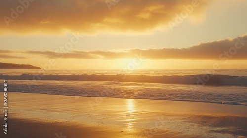 Wallpaper Mural A beautiful sunset over the ocean with a sandy beach in the foreground. Torontodigital.ca
