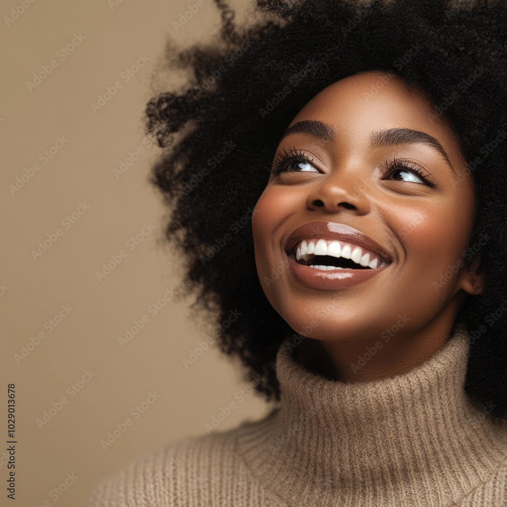Close-Up Portrait of a Young Black Woman Laughing in Neutral Outfit Close-Up Portrait of a Young Black Woman Laughing in Neutral Outfit