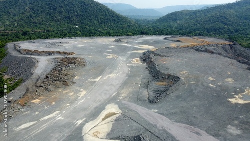 Huge open mine at the brink of the rainforest in Brazil