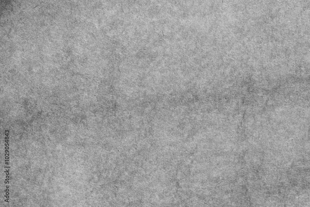 Obraz premium Rough dark grey grains paper texture