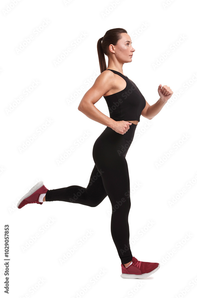 Obraz premium Woman in sportswear running on white background