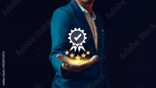 Guarantee product and ISO service concept. Businessman holding and showing the best quality assurance with golden five stars for service.