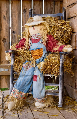 Handmade straw man or woman decoration for fall or Halloween. 