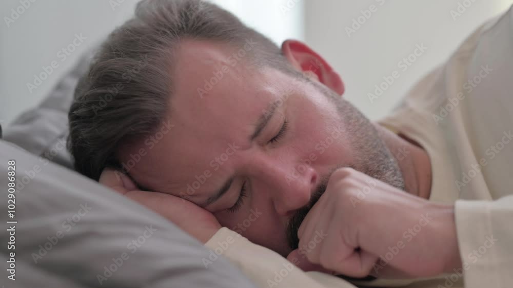 Close up of Coughing Man Lying on Side in Bed Close up of Coughing Man Lying on Side in Bed