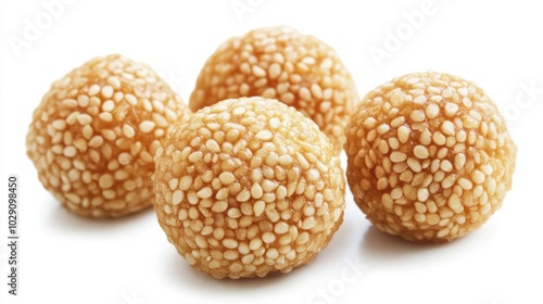 Chinese New Year peanut-filled sesame balls, golden and crispy, isolated on white background