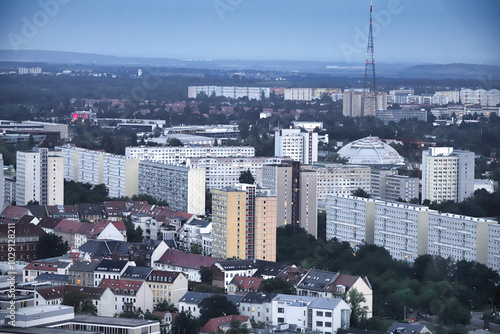 Leipzig, Dämmerung über den hohen Häusern der Stadt photo