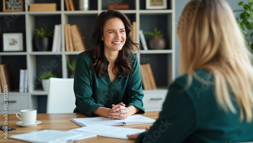 Diverse Female Real Estate Agents Discussing Property with Customer: Home Insurance and Mortgage Sales photo