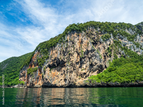 Landscape beautiful summer season vertical horizon look view island mountain tropical shore open sea cloud clean blue sky calm nature ocean wave water nobody travel Koh Muk Trang Thailand sun day time