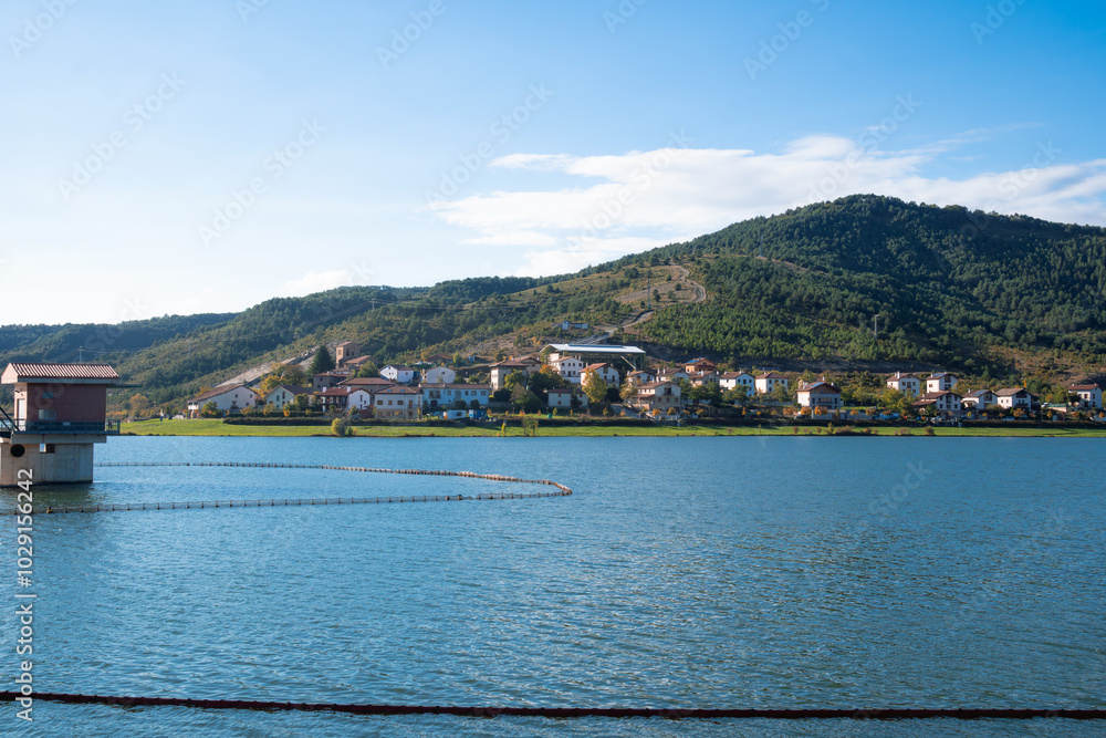 Fototapeta premium a lake with a small house on the shore .Nagore, Arce Valley, navarra