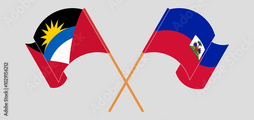 Crossed and waving flags of Antigua and Barbuda and Republic of Haiti. Vector illustration