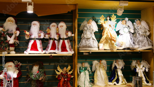 Various Santa Claus, Elves and Angels figures in the store. Decorate the holiday season and bring a touch of welcome to your home. Holiday decoration and seasonal shopping concept