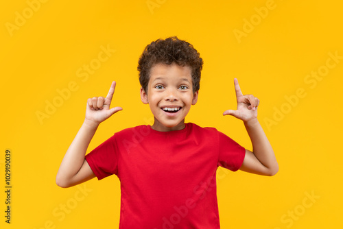 Canvas Print Portrait of  happy smiling excited african american boy looking directly to the
