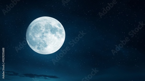 The enchanting beauty of a full moon illuminating the night sky