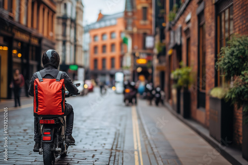 Wallpaper Mural A Food Delivery Driver On A Scooter, Navigating Through A Bustling Urban Street, With A Bright Delivery Bag Prominently Displayed On The Back Torontodigital.ca