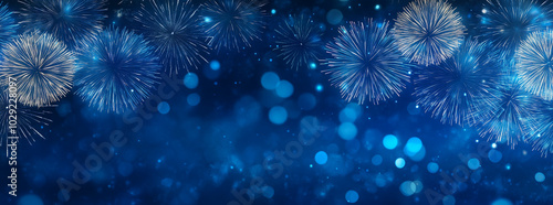 Blue fireworks against a dark blue sky background with copy space, a banner design. New year celebration concept.
