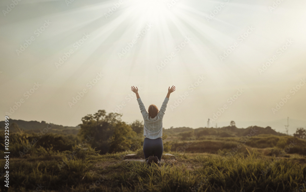 Praising the lord. A woman with her arms raised to the sky in thankfulness and prayer. Themes such as Unity, Calling, Holiness, Holiest, Pure, Purified, Cleanse, Almighty, Refuge Praising the lord. A woman with her arms raised to the sky in thankfulness and prayer. Themes such as Unity, Calling, Holiness, Holiest, Pure, Purified, Cleanse, Almighty, Refuge