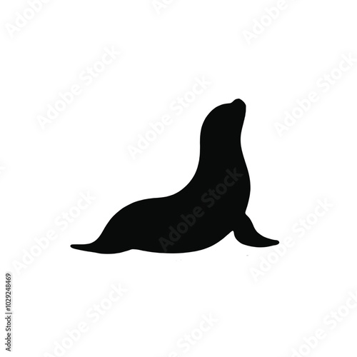 A black silhouette of a sea lion or seal on a white background 