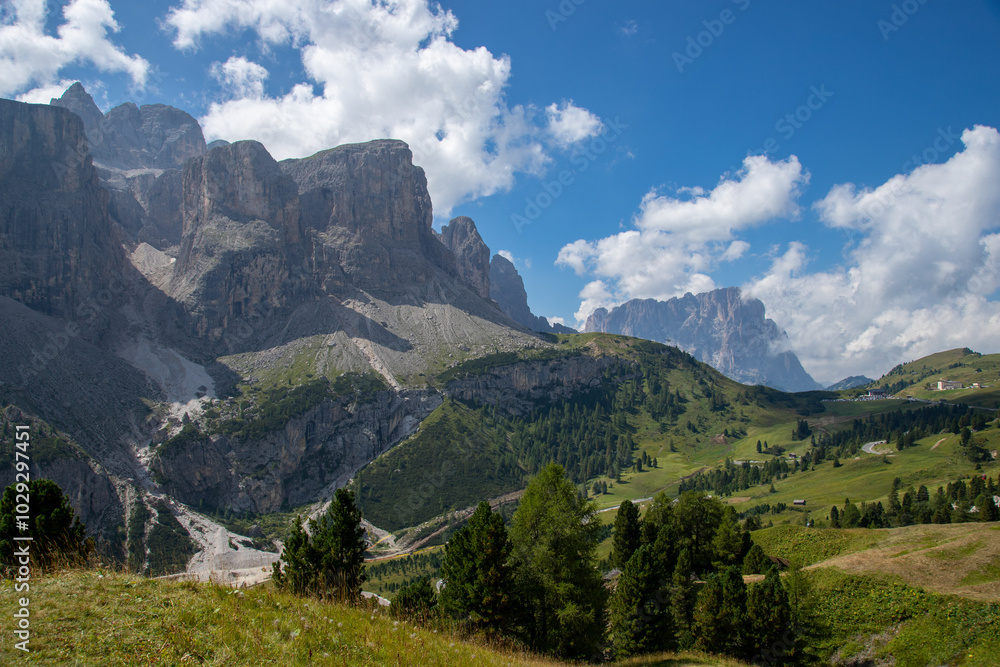 Fototapeta premium Sassolungo mountain, Gardena Pass and Sella Group view from Alta Badia valley on a sunny day, Dolomites, Trentino, Alto Adige, Italy