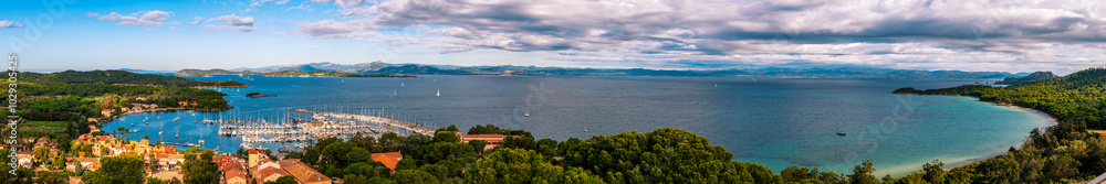 Fototapeta premium Panoramic view of the port of Porquerolles Island, from Fort Sainte Agathe, in the Port Cros National Park, Var, in Provence, France