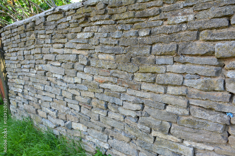 Old wall built of natural stone Old wall built of natural stone