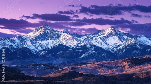 Wallpaper Mural   A mountain range coated in snow beneath a deep blue sky featuring stars scattered throughout the photo Torontodigital.ca