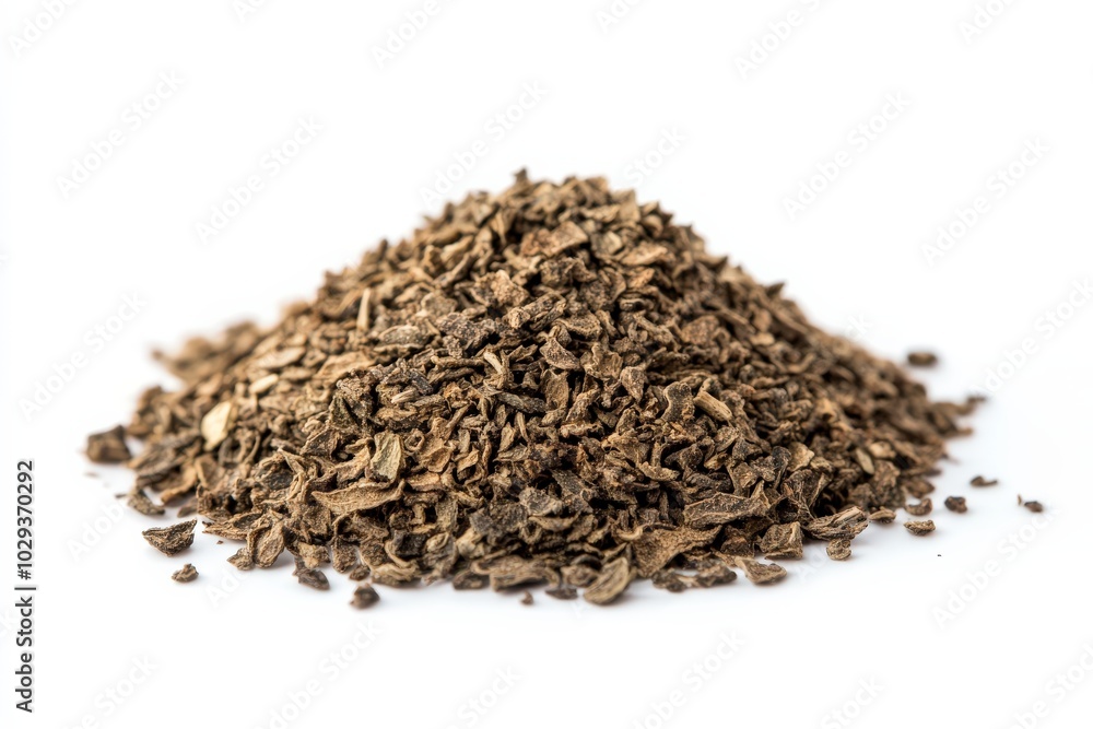 Dried Basil Spice Pile Isolated on White Background - Aromatic Herb from Provence Dried Basil Spice Pile Isolated on White Background - Aromatic Herb from Provence