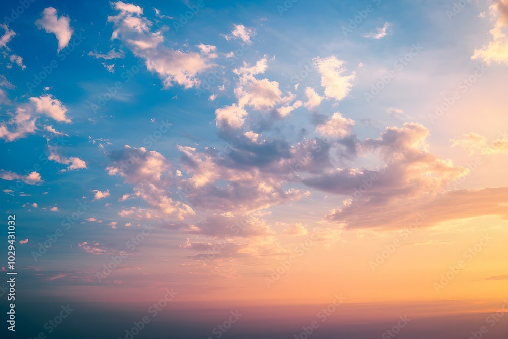 Dawn sky with blue, orange, white hues, glowing clouds near faint horizon Dawn sky with blue, orange, white hues, glowing clouds near faint horizon