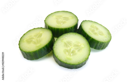 Cucumber and slices isolated over white background.